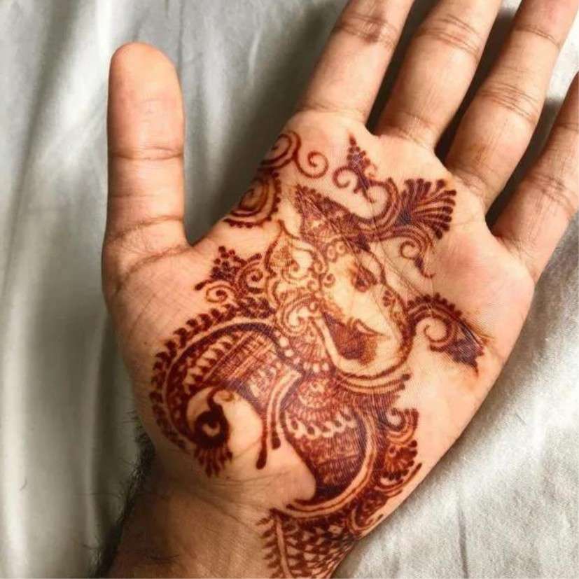 The mehndi design with a religious touch